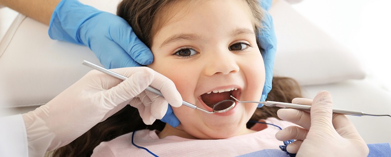 کاشت نگین دندان کودکان | متخصص دندانپزشک کودکان کاشان