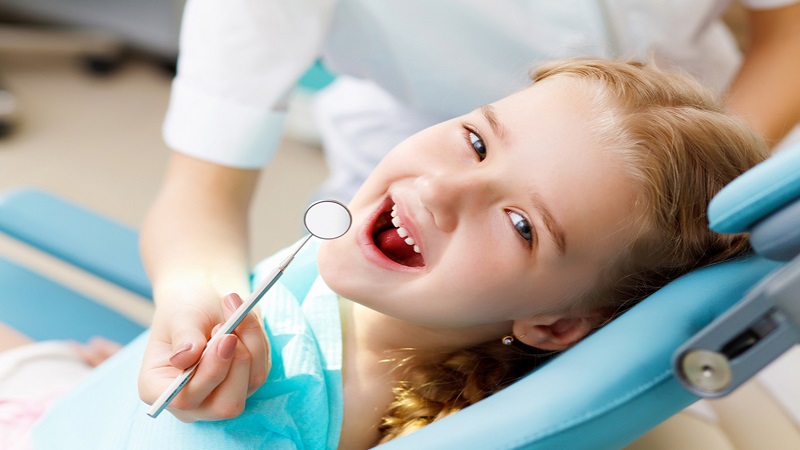 کاشت نگین دندان کودکان | متخصص دندانپزشک کودکان کاشان